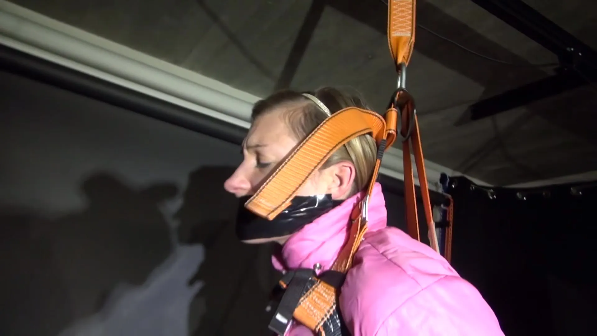 Sexy ***Sandra*** Wearing A Hot Pink Oldschool Downbib And A Down Jacket Being Tied And Gagged With Ropes And A Clothgag Hanging On The Ceiling (Video)