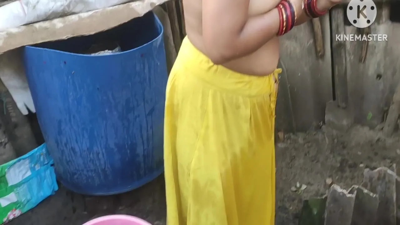 Indian Bhabhi Bathing Outside Hot