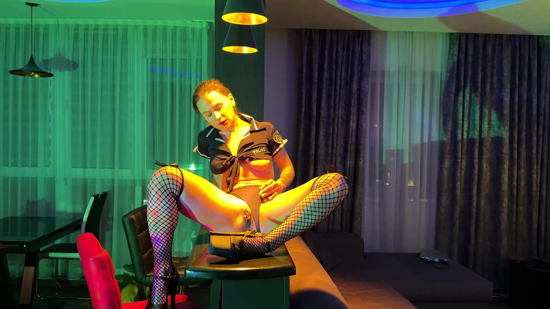 Sexy Policewoman Playing With Her Ass In Heels