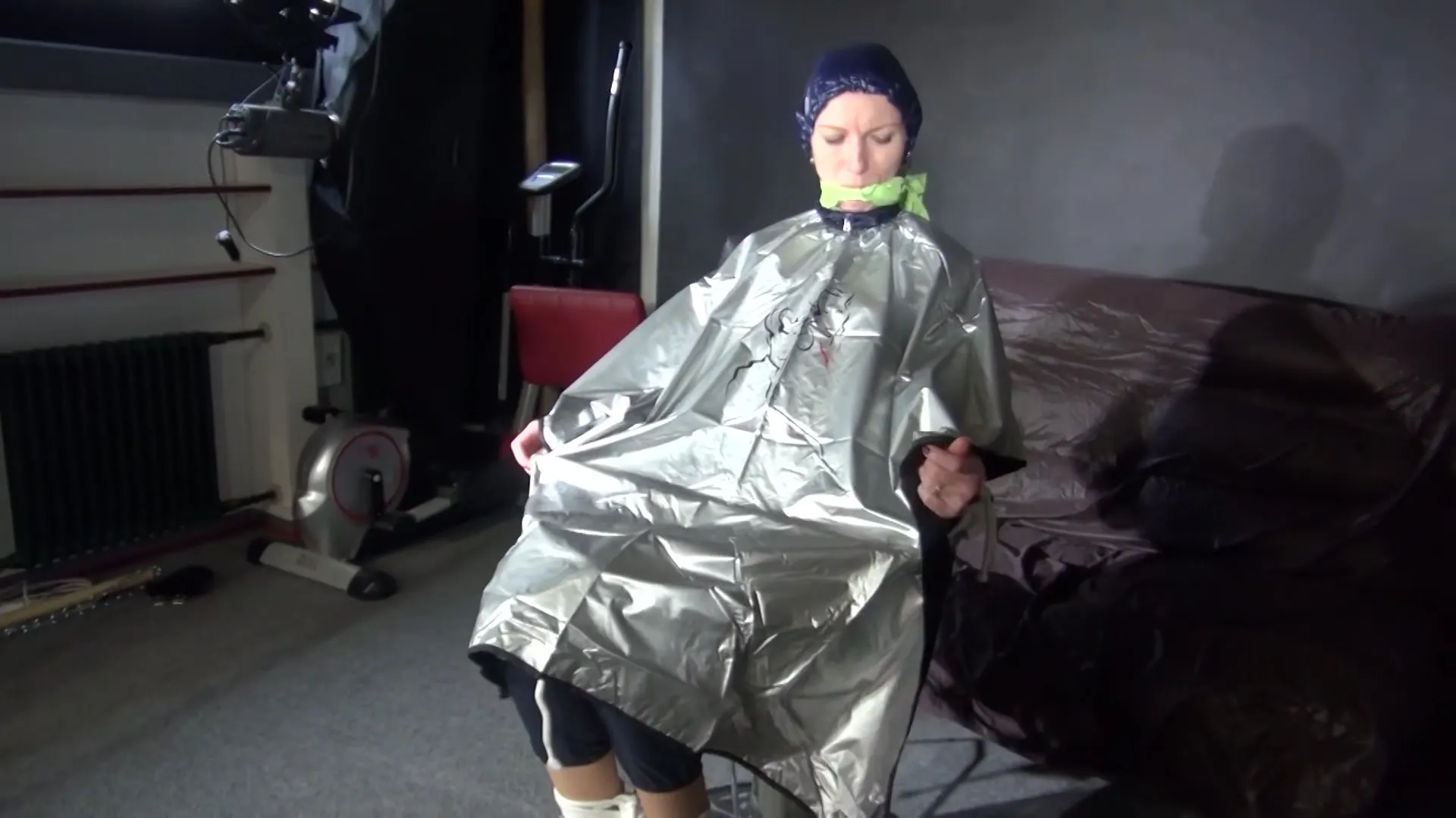 Sexy Ronja Being Tied, Gagged And Hooded On A Chair With A Clothgag Wearing Sexy Blue Shiny Nylon Rainwear (Video)