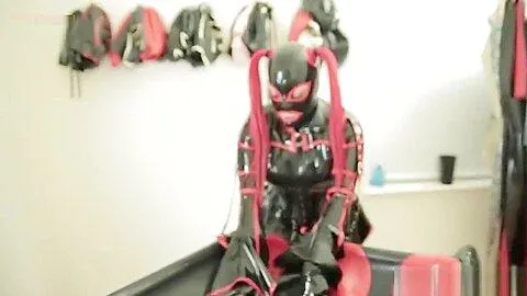 Latex vaccube gasmasked and vibed