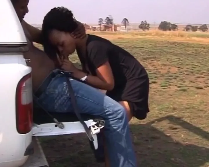 Ebony couple fucking outdoors at back of the truck