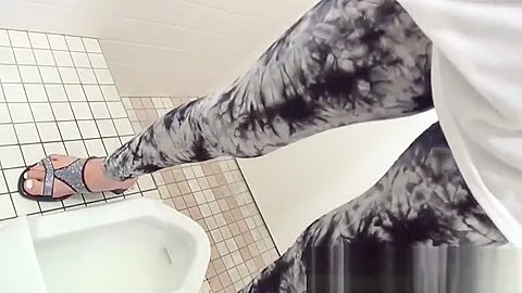 Japanese ladies secretly taped peeing in a bar restroom