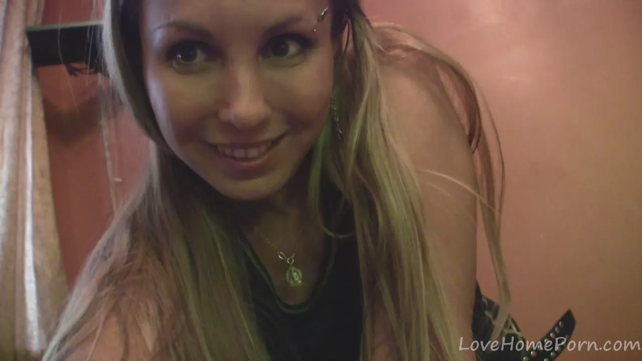 Blonde babe plays with her big tits