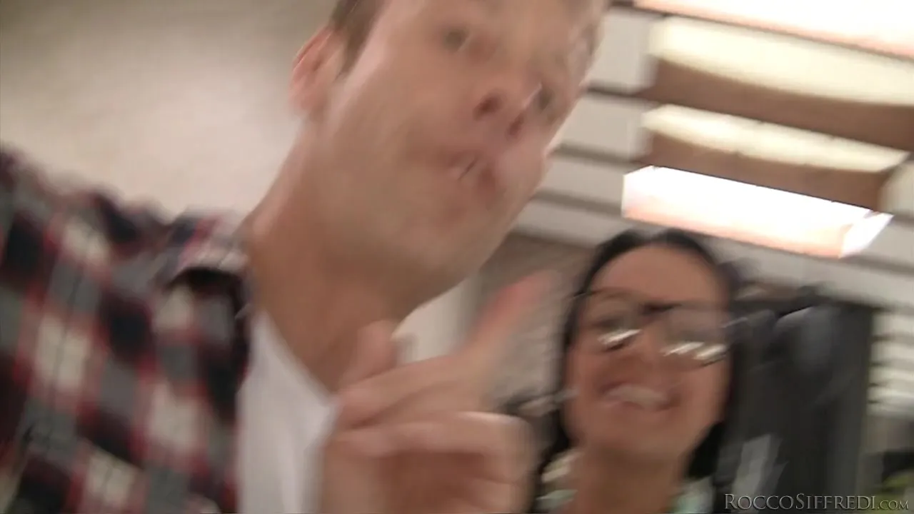 Brunette who likes spanking offers Rocco a fine blowjob