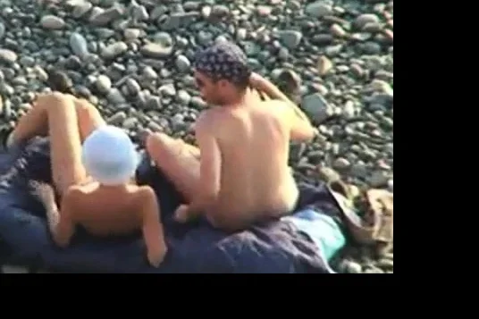 Voyeur on public beach. Oral sex