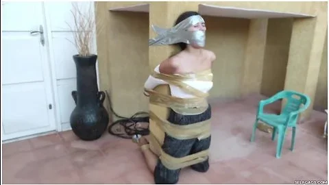 Christian Girl Duct Taped To Pillar And Gagged Tight