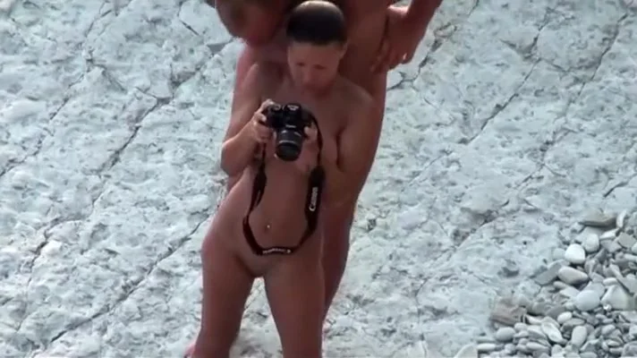 Fat hubby and fit wife on the beach