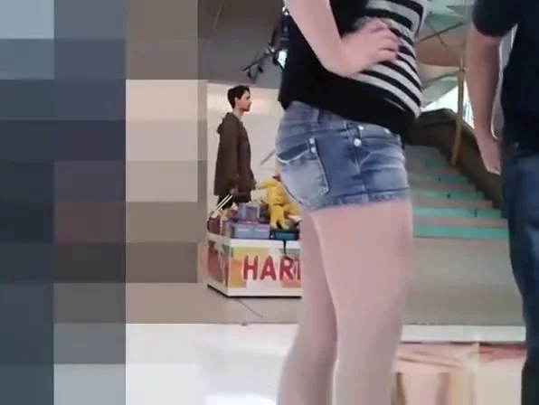 Girl in tight jeans shorts with nice ass