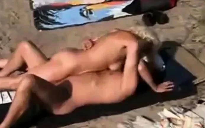 Girl playing w. stranger at lake 2