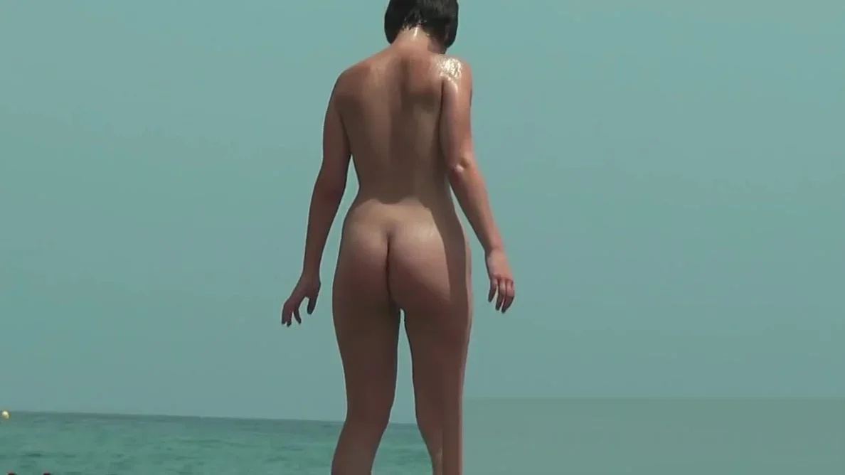 Real beach nudist pussies stretching on the sand