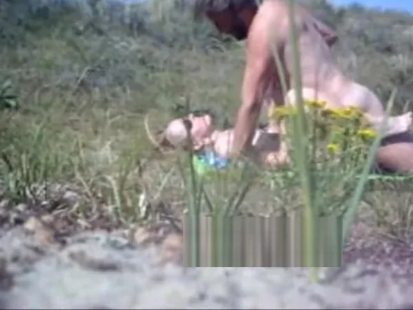 PEOPLE NAKES ON THE BEACH