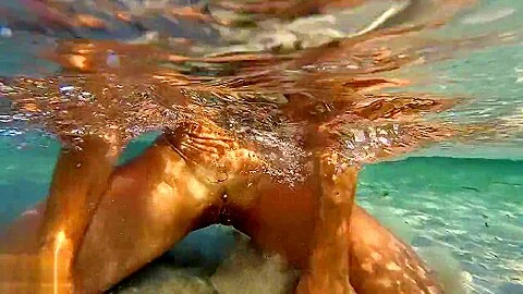 Fuck at the beach. She turns the photographer on while he is shooting her