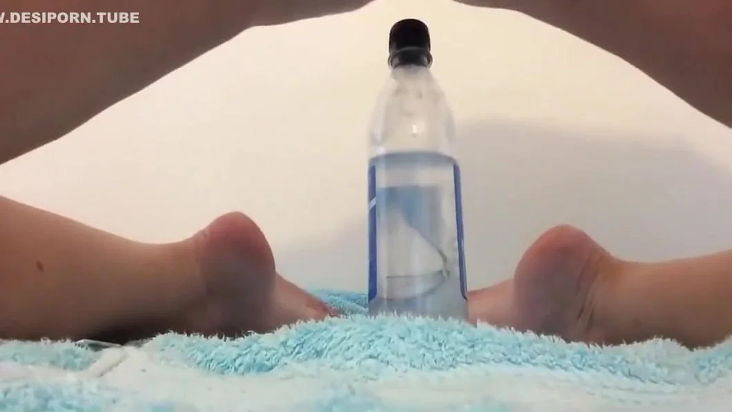 Squirting Over A Bottle Of Water