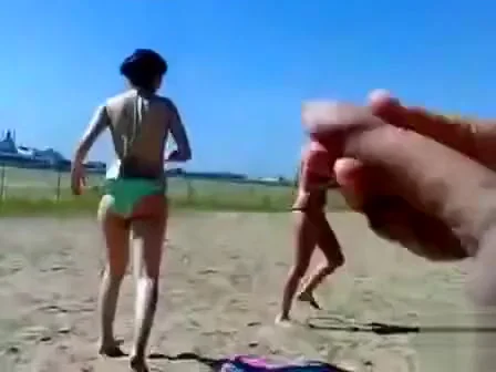 German pervert jerks off to women on topless beach