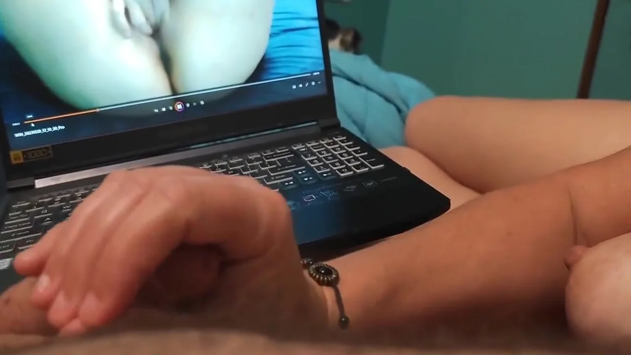 Watch Bella Spank His Cock While Watching Porn