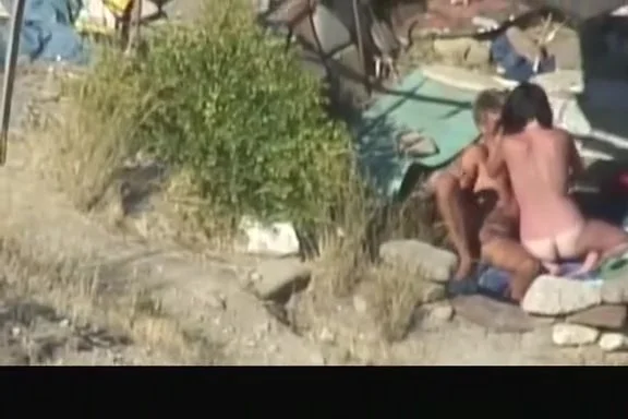 Nude couple banging in the beach