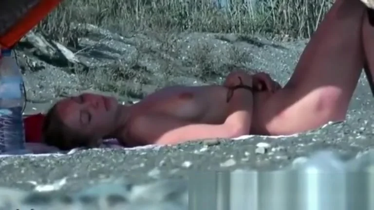 Sexy nudist chicks are being filmed on the beach