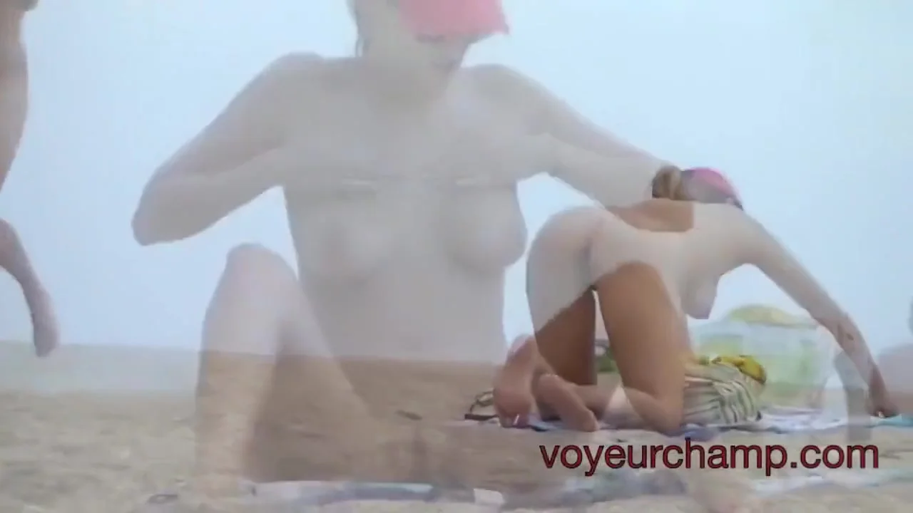 Hot nudist mature woman at the beach filmed