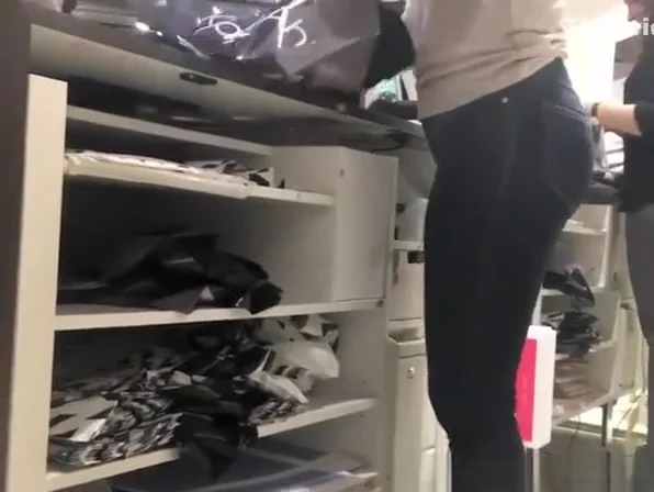 Thick thighs store worker wearing tight jeans