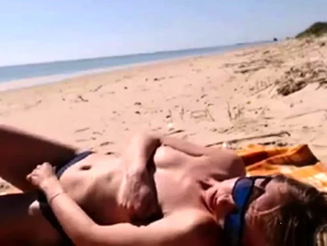 Girl masturbating by the sea