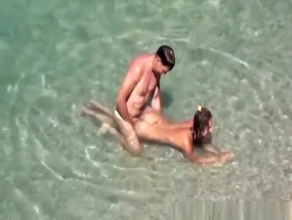 Two couples spied in the beach