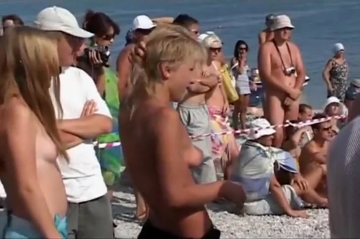 Video shots from a crowded nudist beach