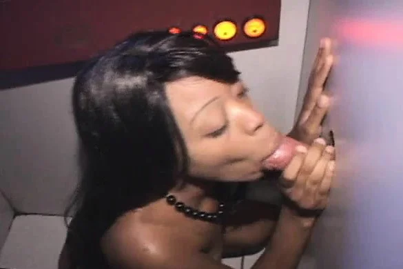 Dark skinned gloryhole slut with a lovely ass Kim worships a few dicks