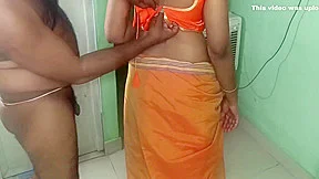 Married Glamour Women Orange Saree Standing Position Romance