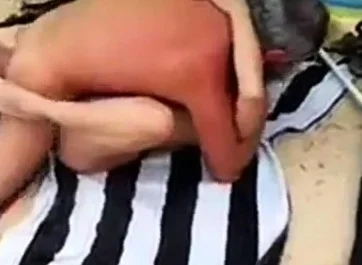 His girl with stranger at the beach