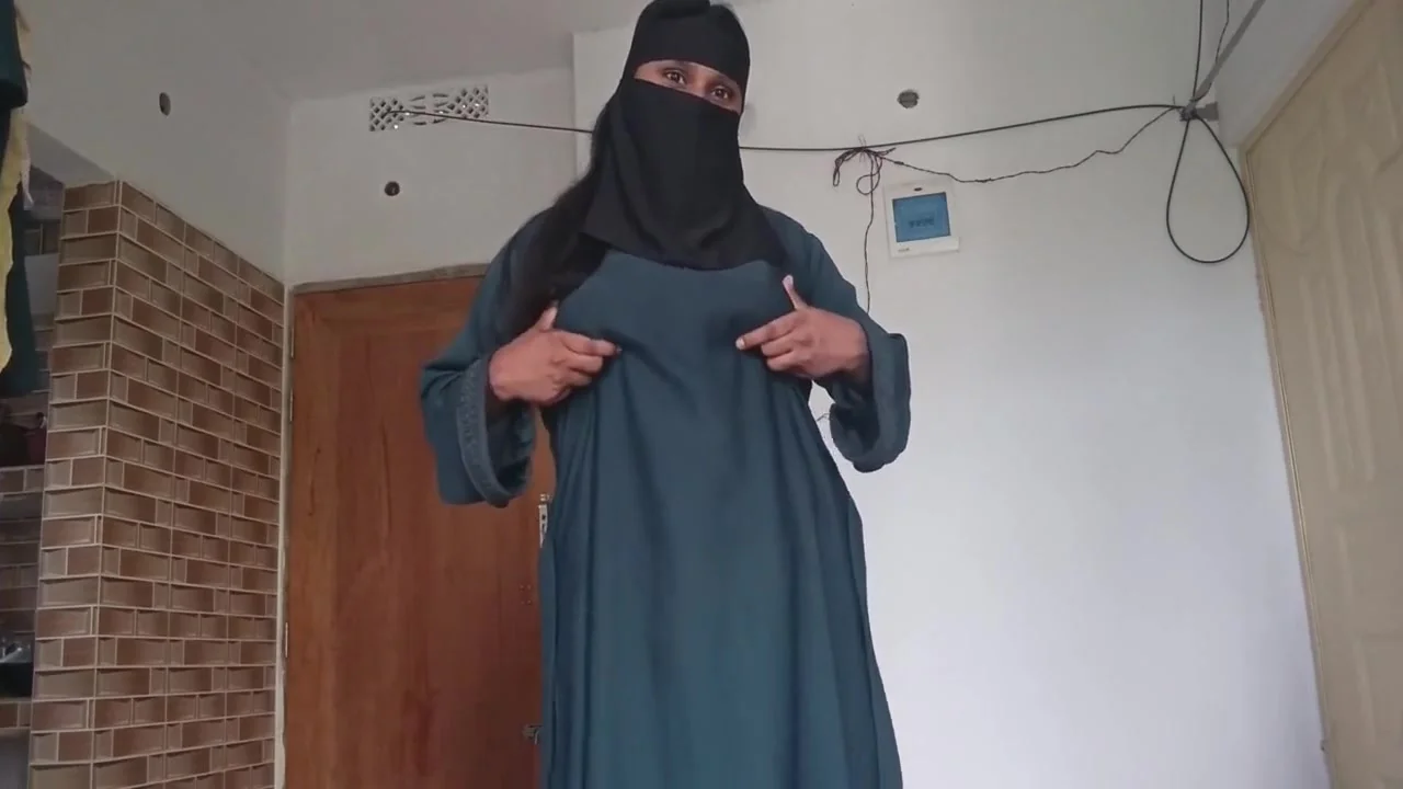 Shy Muslim Girl Taking Off Burqa Slowly