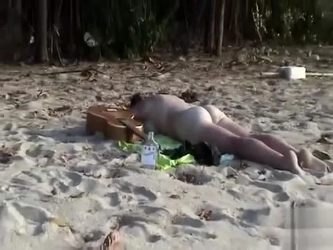 girl sunbathes completely naked