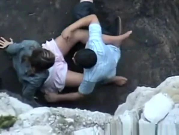 Lovers on Rocky Beach