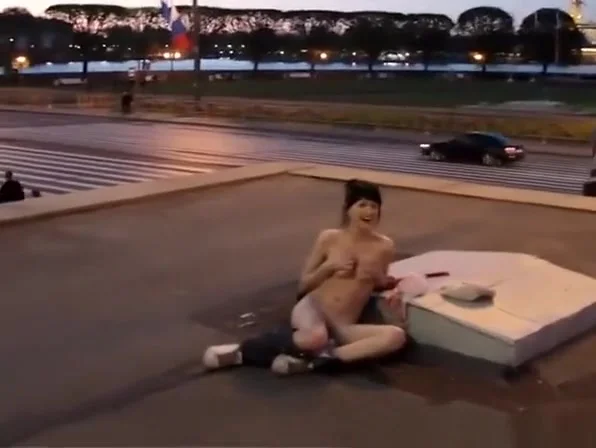 Exhibitionist girl naked in the street