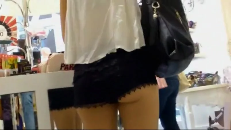 Ass cheeks falling out of lace shorts