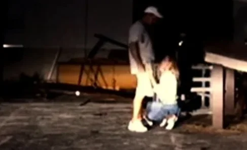 Caught by a stranger while urinating in public