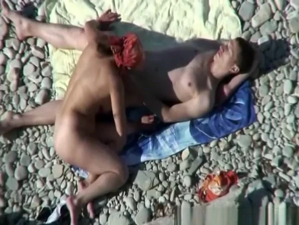 Busty nudist fucked at the beach