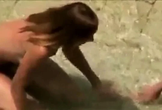 2 girls taking nude pics on the beach