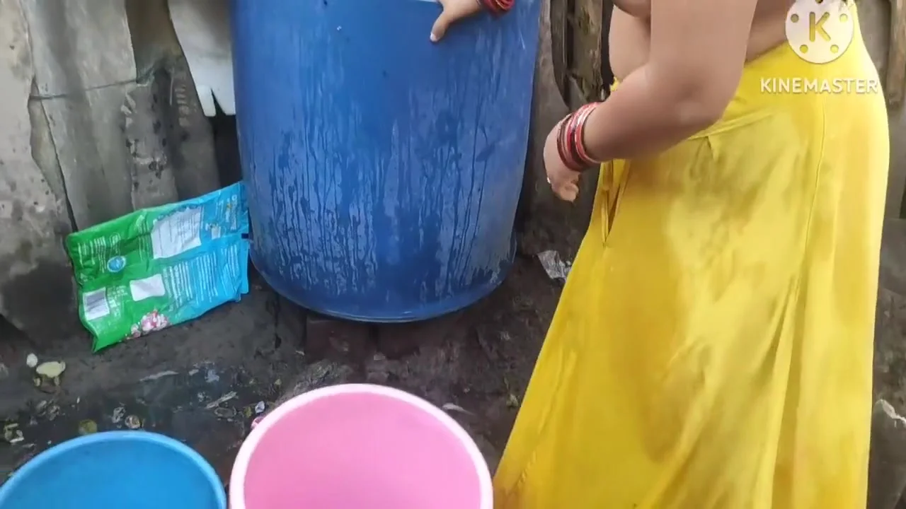 Indian Bhabhi Bathing Outside Hot