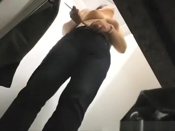 Short hair mature woman trying a swimsuit