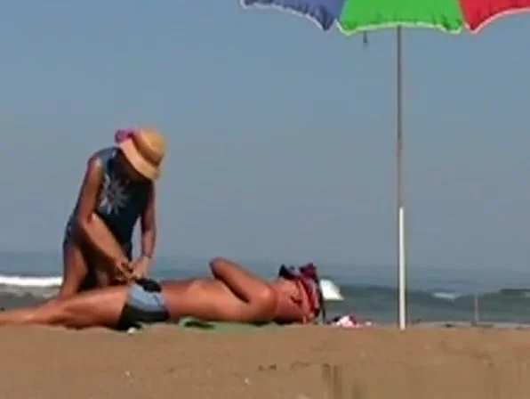 Wife handjob at beach