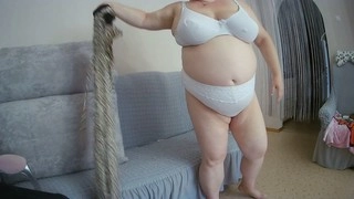 Curvy mother-in-law with ample bosom pleasures herself on camera