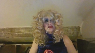 Seductive crossdresser Sarah Millward craves your throbbing cock, enticing you to stroke it over her smoking form, drenching her face and throat in your hot load