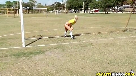 Molly Cavalli and Tiffany Tyler play football