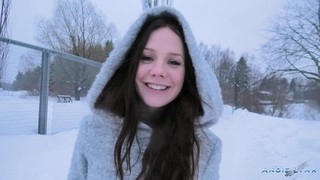 Angie Lynx strutting on ice and snow in sky-high heeled boots