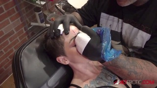 Wild babe Sully Savage gets a fresh forehead tattoo at the studio
